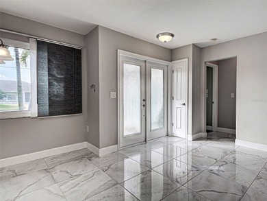 One or more photo(s) has been virtually staged. A Must See! This on Sarasota National Golf Club in Florida - for sale on GolfHomes.com, golf home, golf lot