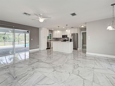 One or more photo(s) has been virtually staged. A Must See! This on Sarasota National Golf Club in Florida - for sale on GolfHomes.com, golf home, golf lot