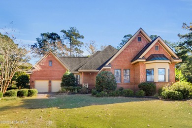 Discover timeless elegance in this custom brick home nestled in on Emerald Golf Club in North Carolina - for sale on GolfHomes.com, golf home, golf lot