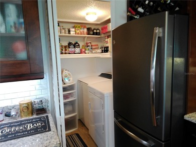 This is a BEAUTIFULLY appointed Condo in a well sought location on East Bay Golf Club in Florida - for sale on GolfHomes.com, golf home, golf lot