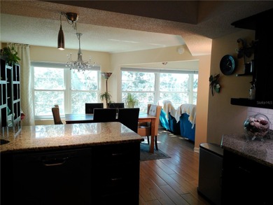 This is a BEAUTIFULLY appointed Condo in a well sought location on East Bay Golf Club in Florida - for sale on GolfHomes.com, golf home, golf lot