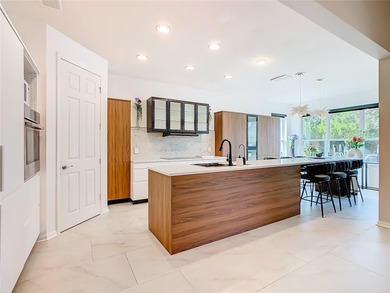 REMODELED & UPDATED Sorano model with 4 BEDROOMS, 3 BATHROOMS on Stonegate Golf Club in Florida - for sale on GolfHomes.com, golf home, golf lot