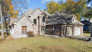 This beautiful stone home sits on the 18th Fairway in The Coves on The Coves Golf Course in Oklahoma - for sale on GolfHomes.com, golf home, golf lot