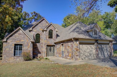 This beautiful stone home sits on the 18th Fairway in The Coves on The Coves Golf Course in Oklahoma - for sale on GolfHomes.com, golf home, golf lot