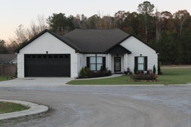 Discover your dream home in this beautiful 3-bedroom, 2-bath on Haleyville Country Club in Alabama - for sale on GolfHomes.com, golf home, golf lot