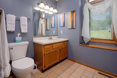 Nestled in a serene setting with tree-lined backdrop, this on Eagle Ridge Inn and Resort in Illinois - for sale on GolfHomes.com, golf home, golf lot