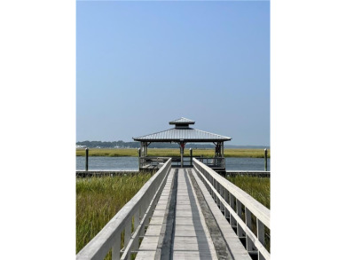 Take advantage of this beautiful lot behind the Coopers Point on Sapelo Hammock Golf Club in Georgia - for sale on GolfHomes.com, golf home, golf lot