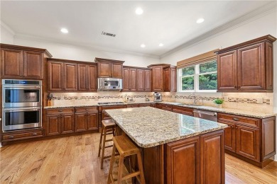 Introducing a truly stunning four-sides brick estate in the on Marietta Country Club in Georgia - for sale on GolfHomes.com, golf home, golf lot