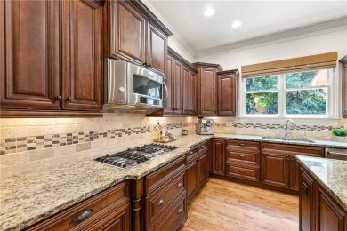 Introducing a truly stunning four-sides brick estate in the on Marietta Country Club in Georgia - for sale on GolfHomes.com, golf home, golf lot