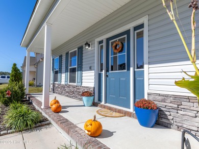 Welcome to this stunning 4 bedroom, 2.5 bath home with an on Rock Creek Country Club in North Carolina - for sale on GolfHomes.com, golf home, golf lot