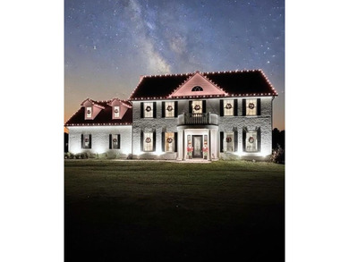 Colonial house adjacent to the golf course with lake view and on Cedar Creek Country Club in Texas - for sale on GolfHomes.com, golf home, golf lot