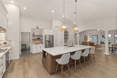 Experience refined Florida living in this fully remodeled on Rotonda Golf and Country Club The Links Course in Florida - for sale on GolfHomes.com, golf home, golf lot