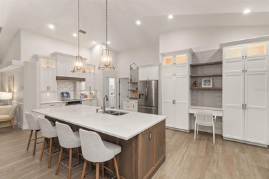 Experience refined Florida living in this fully remodeled on Rotonda Golf and Country Club The Links Course in Florida - for sale on GolfHomes.com, golf home, golf lot