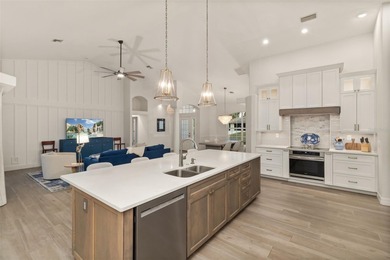 Experience refined Florida living in this fully remodeled on Rotonda Golf and Country Club The Links Course in Florida - for sale on GolfHomes.com, golf home, golf lot