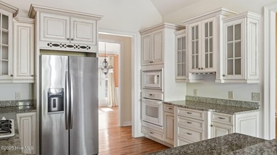 Welcome to 380 Grove Rd, a beautifully crafted Bundy Homes on Pine Needles Lodge and Golf Club in North Carolina - for sale on GolfHomes.com, golf home, golf lot