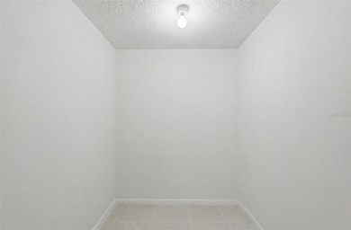 Welcome to your own piece of paradise! This beautifully updated on Isla Del Sol Yacht and Country Club in Florida - for sale on GolfHomes.com, golf home, golf lot