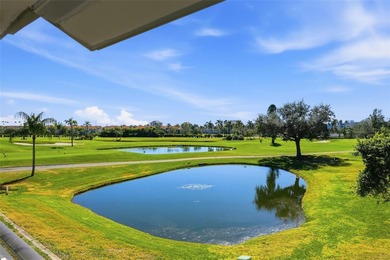 Welcome to your own piece of paradise! This beautifully updated on Isla Del Sol Yacht and Country Club in Florida - for sale on GolfHomes.com, golf home, golf lot