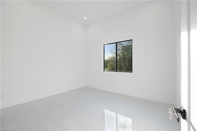 Welcome to 705 16th Street NE, a stunning contemporary on The Club At Twin Eagles in Florida - for sale on GolfHomes.com, golf home, golf lot