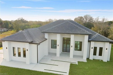 Welcome to 705 16th Street NE, a stunning contemporary on The Club At Twin Eagles in Florida - for sale on GolfHomes.com, golf home, golf lot