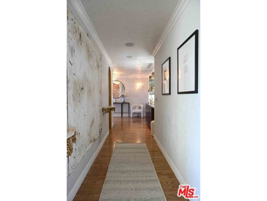 PRICE IMPROVEMENT.... Soar into sky-high luxury in this rare and on Los Angeles Country Club in California - for sale on GolfHomes.com, golf home, golf lot