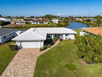 This ADORABLE and meticulously maintained residence is located on Jacaranda West Country Club in Florida - for sale on GolfHomes.com, golf home, golf lot