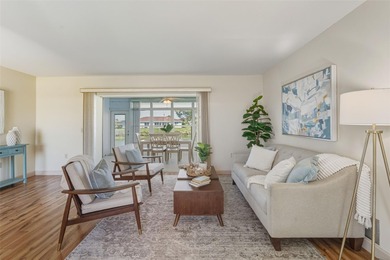 This ADORABLE and meticulously maintained residence is located on Jacaranda West Country Club in Florida - for sale on GolfHomes.com, golf home, golf lot