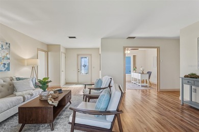 This ADORABLE and meticulously maintained residence is located on Jacaranda West Country Club in Florida - for sale on GolfHomes.com, golf home, golf lot