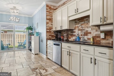 Imagine retreating to your spacious master suite on the main on Black Creek Golf Club in Georgia - for sale on GolfHomes.com, golf home, golf lot