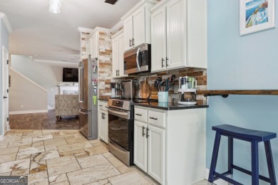 Imagine retreating to your spacious master suite on the main on Black Creek Golf Club in Georgia - for sale on GolfHomes.com, golf home, golf lot