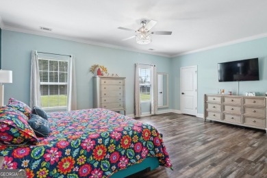 Imagine retreating to your spacious master suite on the main on Black Creek Golf Club in Georgia - for sale on GolfHomes.com, golf home, golf lot