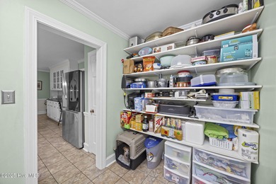 Welcome to 223 Churchill Drive, a charming and well-loved home on Brook Valley Country Club in North Carolina - for sale on GolfHomes.com, golf home, golf lot