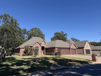Updated one level 4 bed 2 bath on the golf course! 3 car garage on The Country Club of Arkansas in Arkansas - for sale on GolfHomes.com, golf home, golf lot