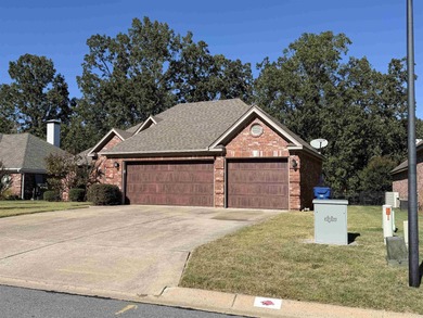 Updated one level 4 bed 2 bath on the golf course! 3 car garage on The Country Club of Arkansas in Arkansas - for sale on GolfHomes.com, golf home, golf lot