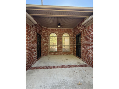 Updated one level 4 bed 2 bath on the golf course! 3 car garage on The Country Club of Arkansas in Arkansas - for sale on GolfHomes.com, golf home, golf lot