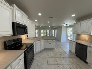 Updated one level 4 bed 2 bath on the golf course! 3 car garage on The Country Club of Arkansas in Arkansas - for sale on GolfHomes.com, golf home, golf lot