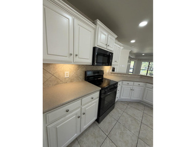 Updated one level 4 bed 2 bath on the golf course! 3 car garage on The Country Club of Arkansas in Arkansas - for sale on GolfHomes.com, golf home, golf lot