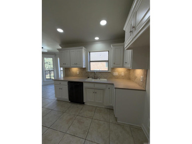 Updated one level 4 bed 2 bath on the golf course! 3 car garage on The Country Club of Arkansas in Arkansas - for sale on GolfHomes.com, golf home, golf lot