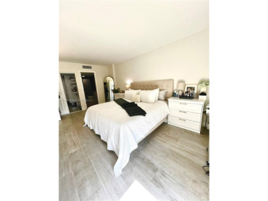 Step into this tastefully renovated 2-bedroom, 2-bath residence on Turnberry Isle Resort and Club in Florida - for sale on GolfHomes.com, golf home, golf lot
