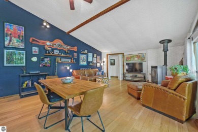 Anchor your Northern Michigan adventures at this architecturally on The Chief Golf Course in Michigan - for sale on GolfHomes.com, golf home, golf lot