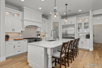Step into this elegant home nestled in the prestigious Sanctuary on Highland Meadows Golf Course in Colorado - for sale on GolfHomes.com, golf home, golf lot