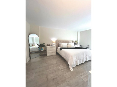 Step into this tastefully renovated 2-bedroom, 2-bath residence on Turnberry Isle Resort and Club in Florida - for sale on GolfHomes.com, golf home, golf lot