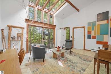 Anchor your Northern Michigan adventures at this architecturally on The Chief Golf Course in Michigan - for sale on GolfHomes.com, golf home, golf lot