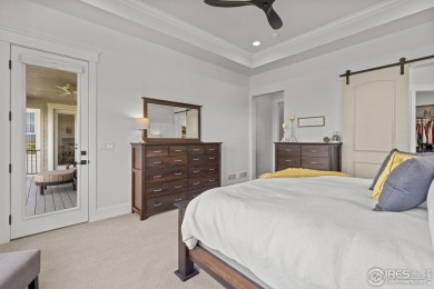 Step into this elegant home nestled in the prestigious Sanctuary on Highland Meadows Golf Course in Colorado - for sale on GolfHomes.com, golf home, golf lot