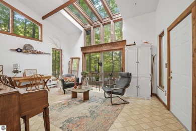 Anchor your Northern Michigan adventures at this architecturally on The Chief Golf Course in Michigan - for sale on GolfHomes.com, golf home, golf lot