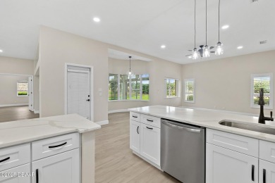 Welcome to 38 Kinsgley Circle! This updated home is move in on Plantation Bay Golf and Country Club in Florida - for sale on GolfHomes.com, golf home, golf lot