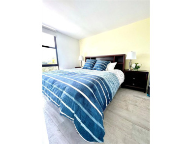 Step into this tastefully renovated 2-bedroom, 2-bath residence on Turnberry Isle Resort and Club in Florida - for sale on GolfHomes.com, golf home, golf lot