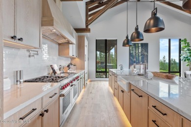 Welcome to this modern lakeview retreat, where thoughtful design on Gozzer Ranch Golf and Lake Club in Idaho - for sale on GolfHomes.com, golf home, golf lot