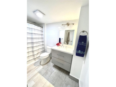 Step into this tastefully renovated 2-bedroom, 2-bath residence on Turnberry Isle Resort and Club in Florida - for sale on GolfHomes.com, golf home, golf lot