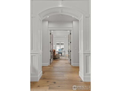 Step into this elegant home nestled in the prestigious Sanctuary on Highland Meadows Golf Course in Colorado - for sale on GolfHomes.com, golf home, golf lot