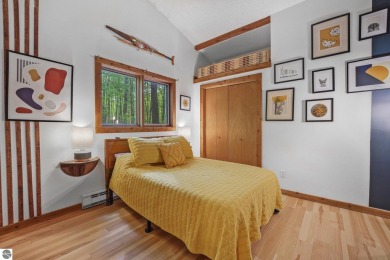 Anchor your Northern Michigan adventures at this architecturally on The Chief Golf Course in Michigan - for sale on GolfHomes.com, golf home, golf lot